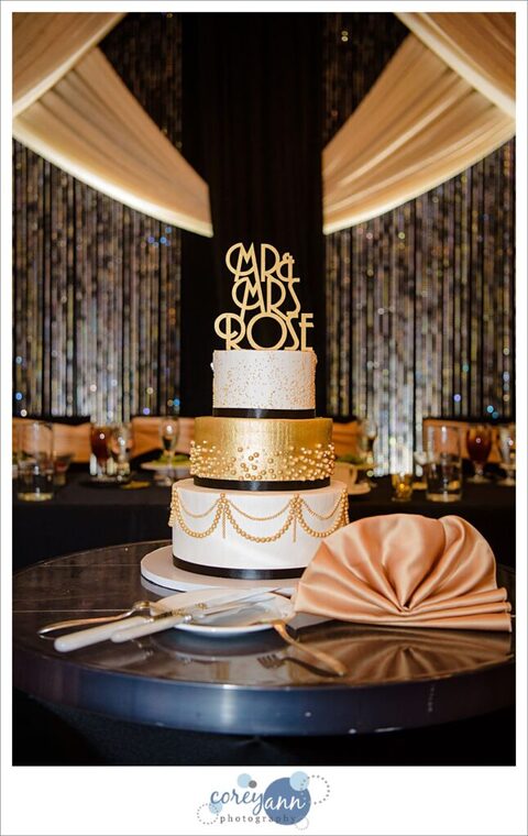 Gold and white New Years Eve Wedding Cake