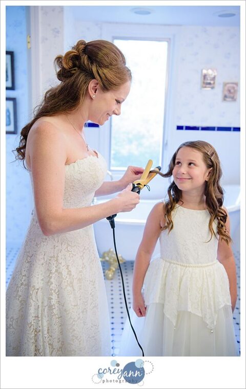 Bride and stepdaughter getting ready for wedding in Ohio