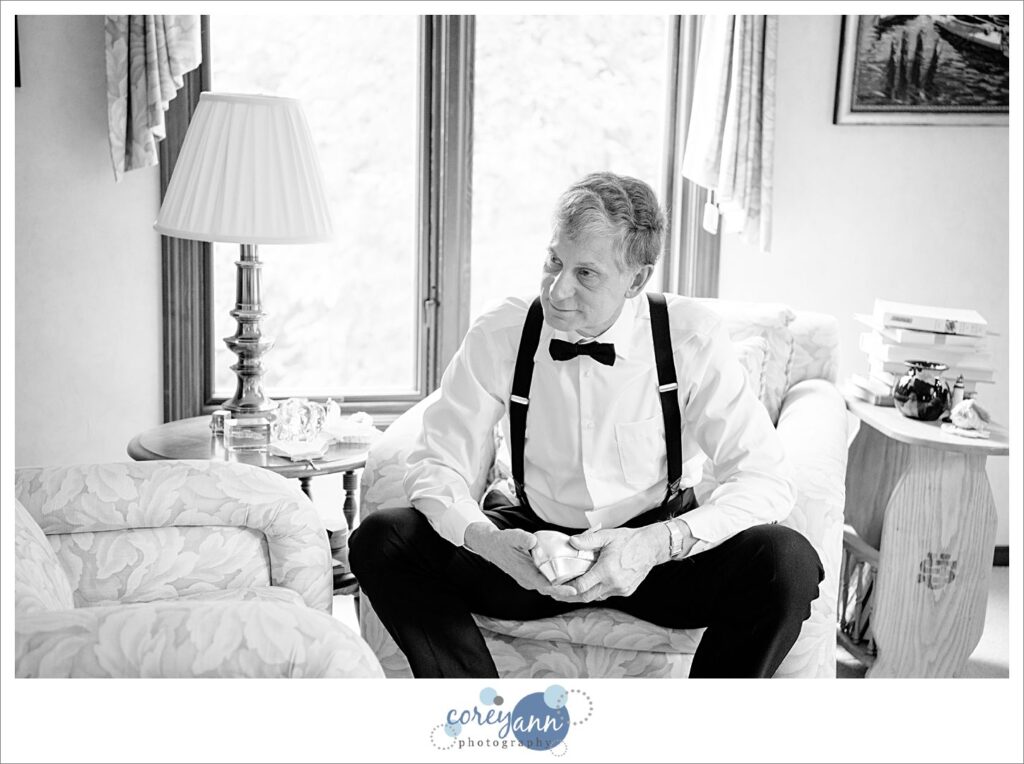 Grandpa seeing flower girl for first time