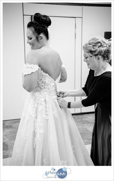 Bride getting ready for wedding at Divine Word in Kirtland