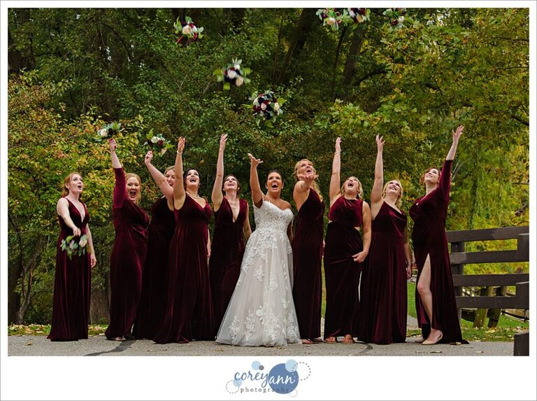 Bridesmaids in red velvet gowns