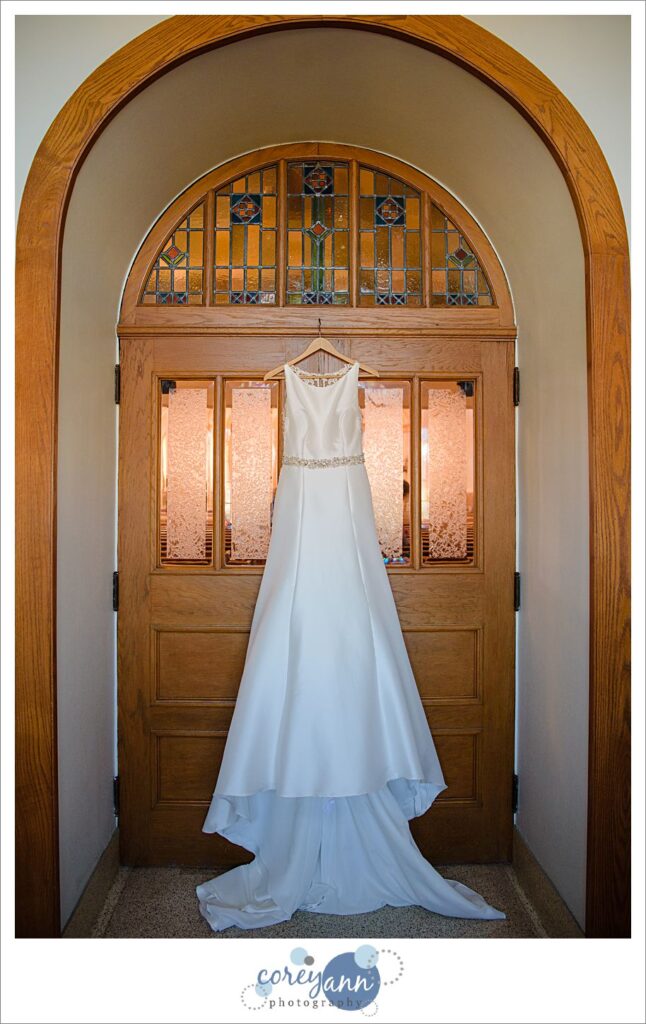 Wedding dress hanging at st vincent de paul in Akrom
