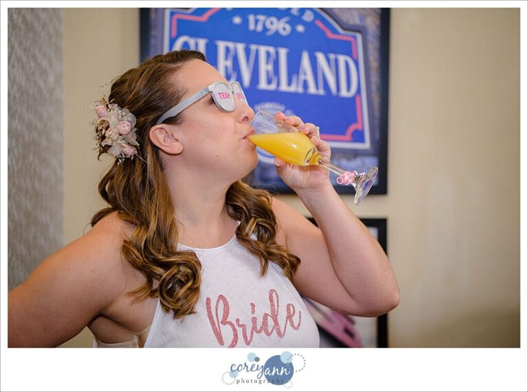 Bride drinking before wedding in Cleveland