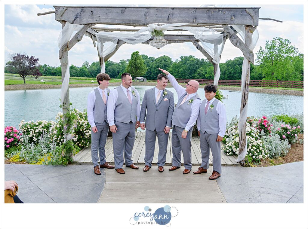 Groom and groomsman at Peacock Ridge