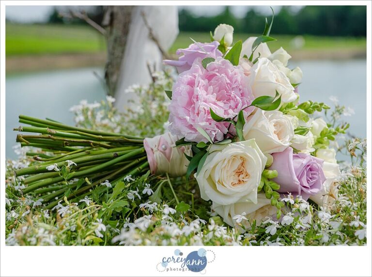 hand tied wedding bouquet with white roese and pink peonies