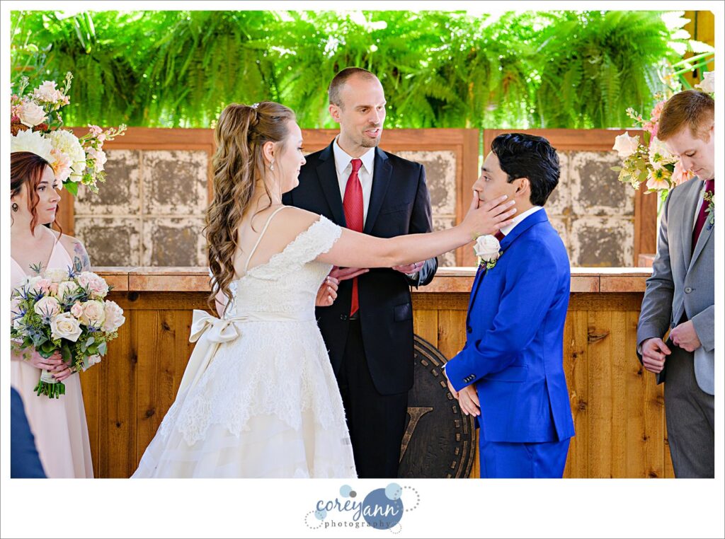 Emotional groom during wedding ceremony at Gervasi Vineyard