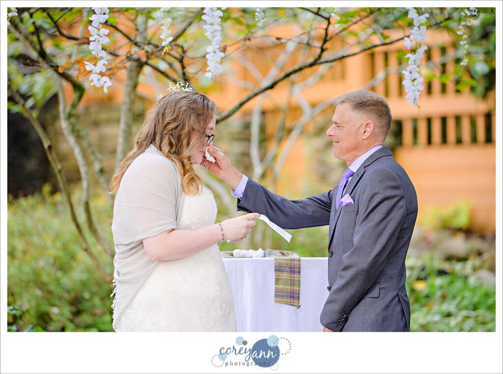 Outdoor wedding ceremony at Landoll's Mohican Castle