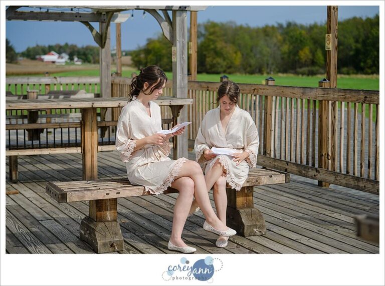 Brides reading letters to one another before wedding in Louisville Ohio