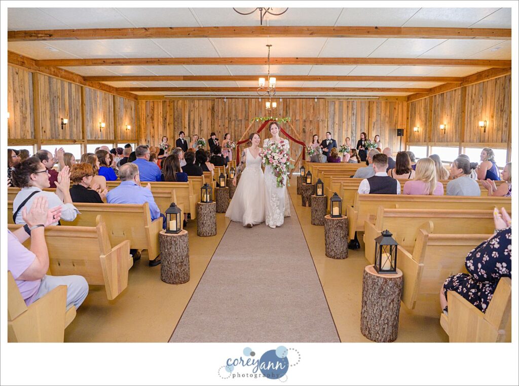 Wedding ceremony with two brides at Brookside Farm 