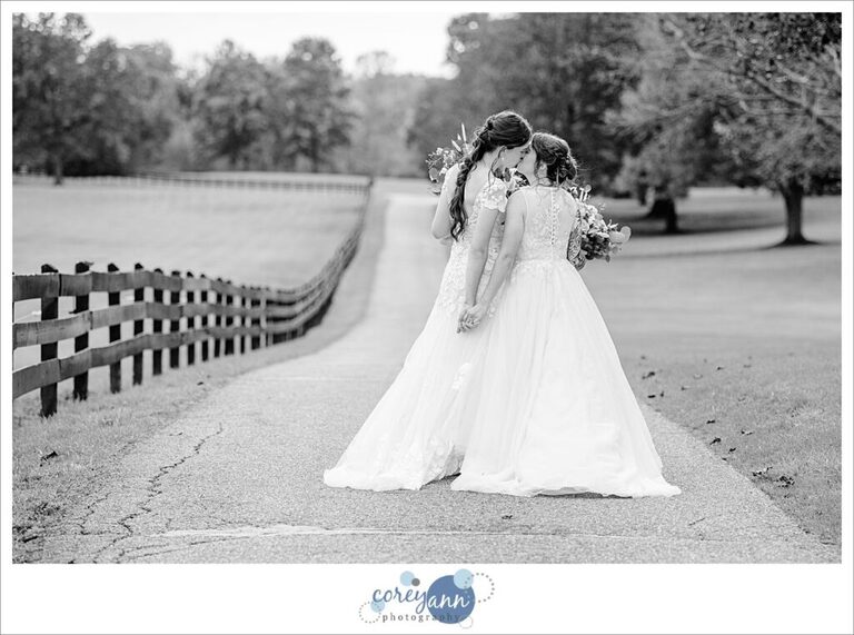 Lesbian couple walking after wedding at Brookside Farm in Ohio