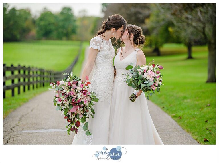 Lesbian couple walking after wedding at Brookside Farm in Ohio