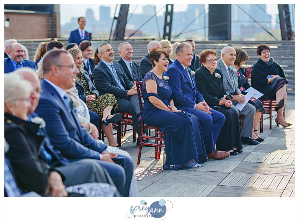 Family watching their children get married in October in Cleveland