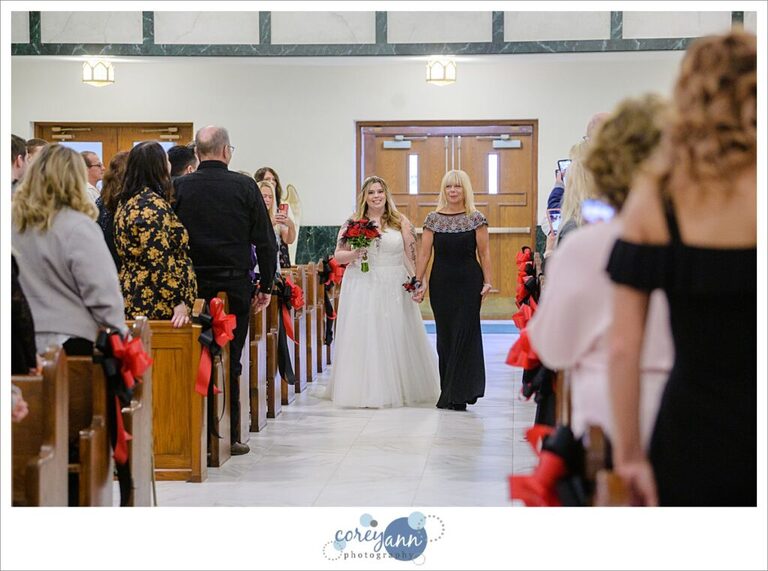Bride and mother walking down aisle at Mount Carmel Church in Niles Ohio