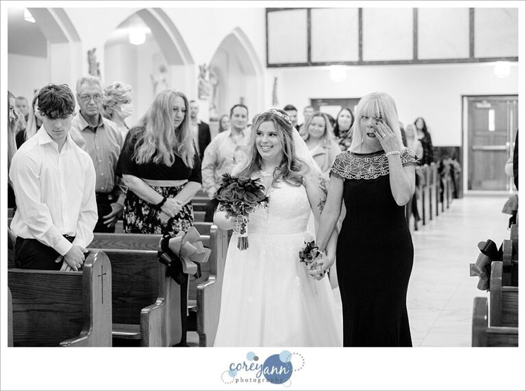 Bride and mother walking down aisle at Mount Carmel Church in Niles Ohio