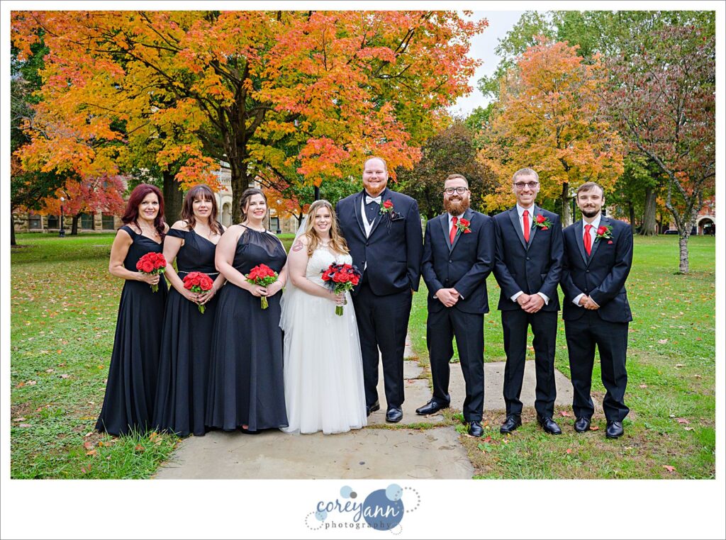 Wedding bridal party photo underneath fall leaves in Warren Ohio