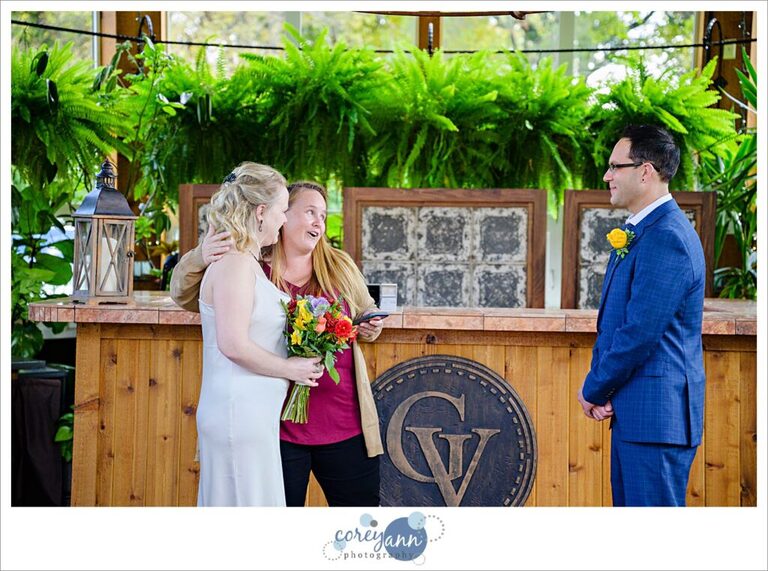 A micro wedding ceremony in the conservatory at Gervasi Vineyard.