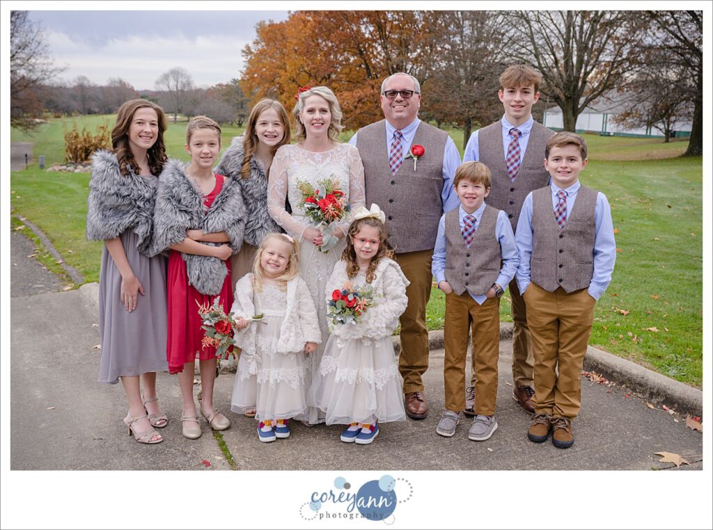 Bride and Groom with children attendants for their wedding in Green Ohio