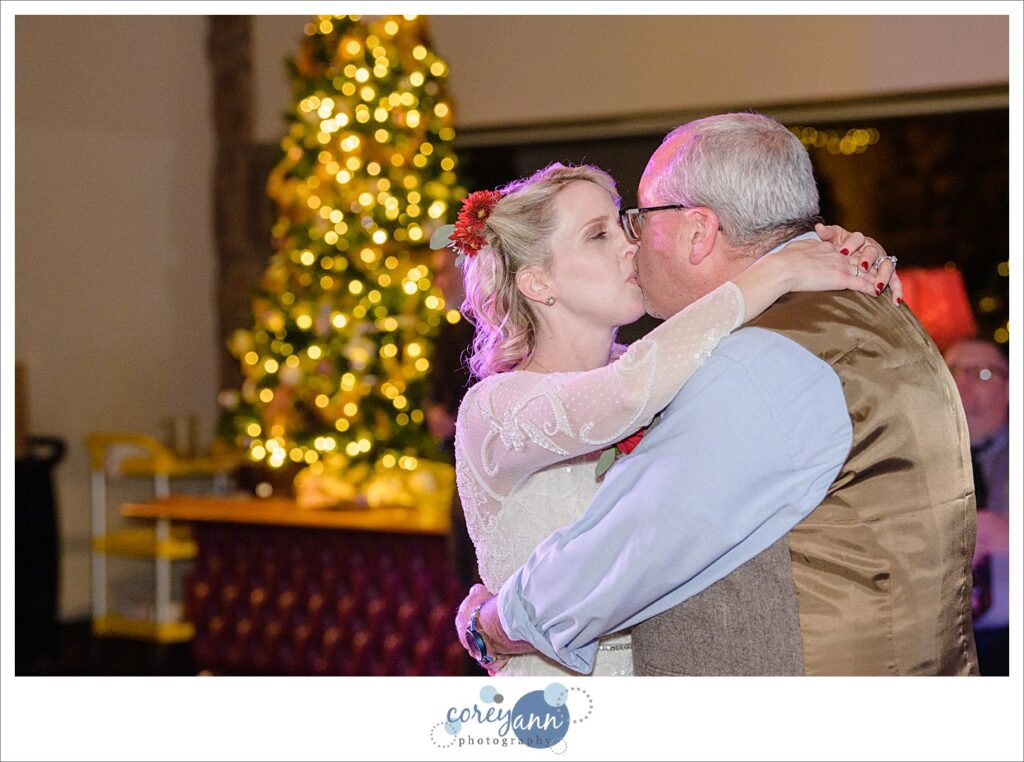 Bride and groom first dance during wedding reception at Prestwick Country Club in Green.