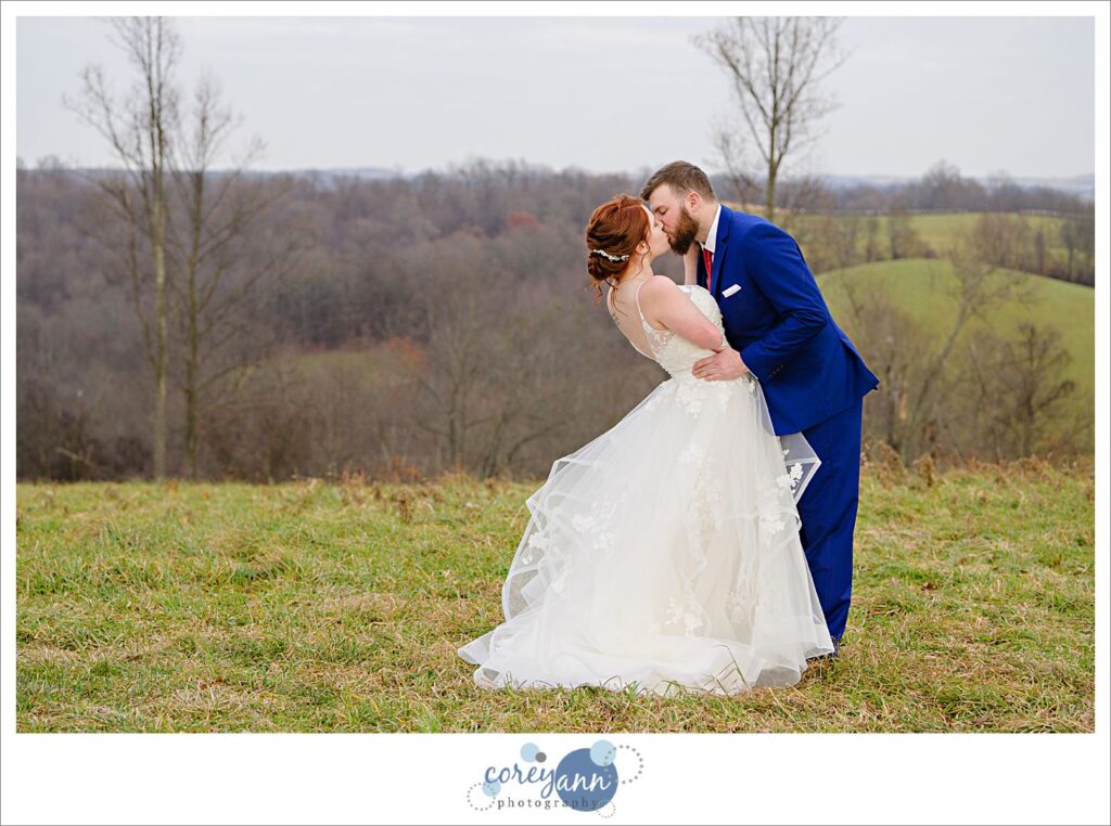 Bride and Groom at the hilltop at Rivercrest Farm on their wedding day.