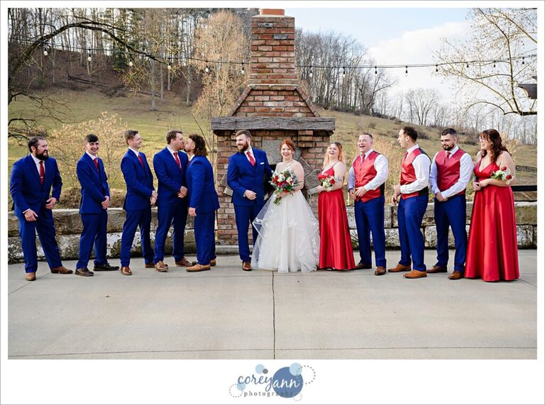 Wedding bridal party in red and blue at Rivercrest Farm in Dover Ohio