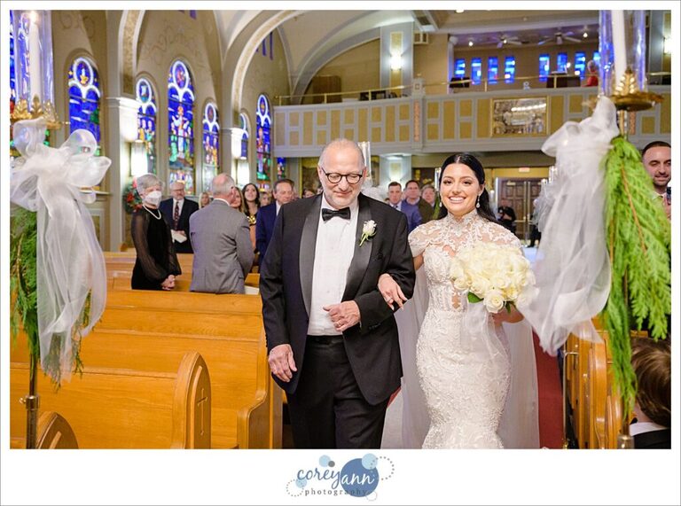 Bride walking down aisle at St. Haralambos Greek Orthodox Church in Canton Ohio