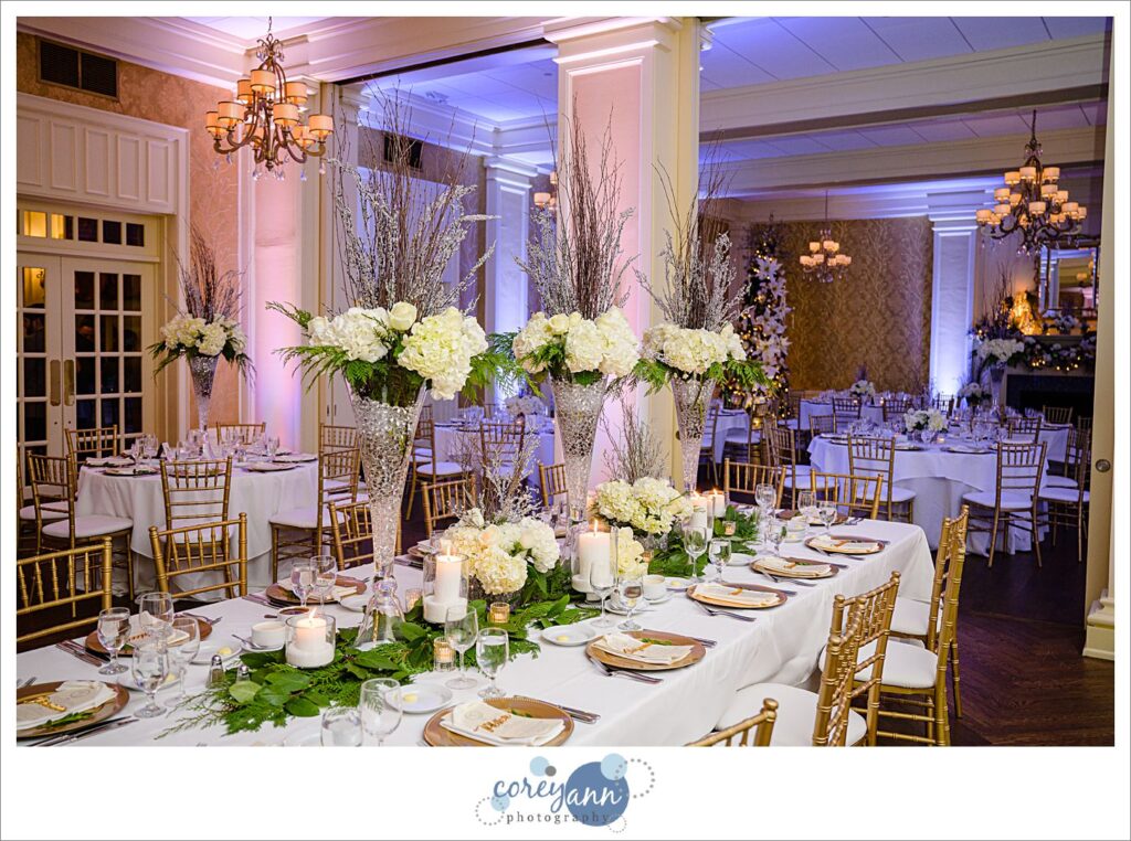 White and gold winter wedding reception decor at Brookside Country Club