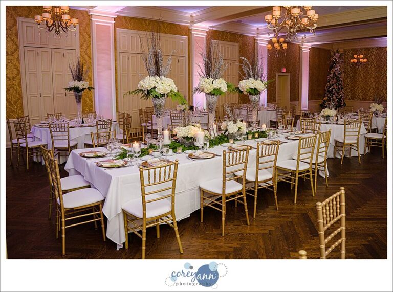 White and gold winter wedding reception decor at Brookside Country Club