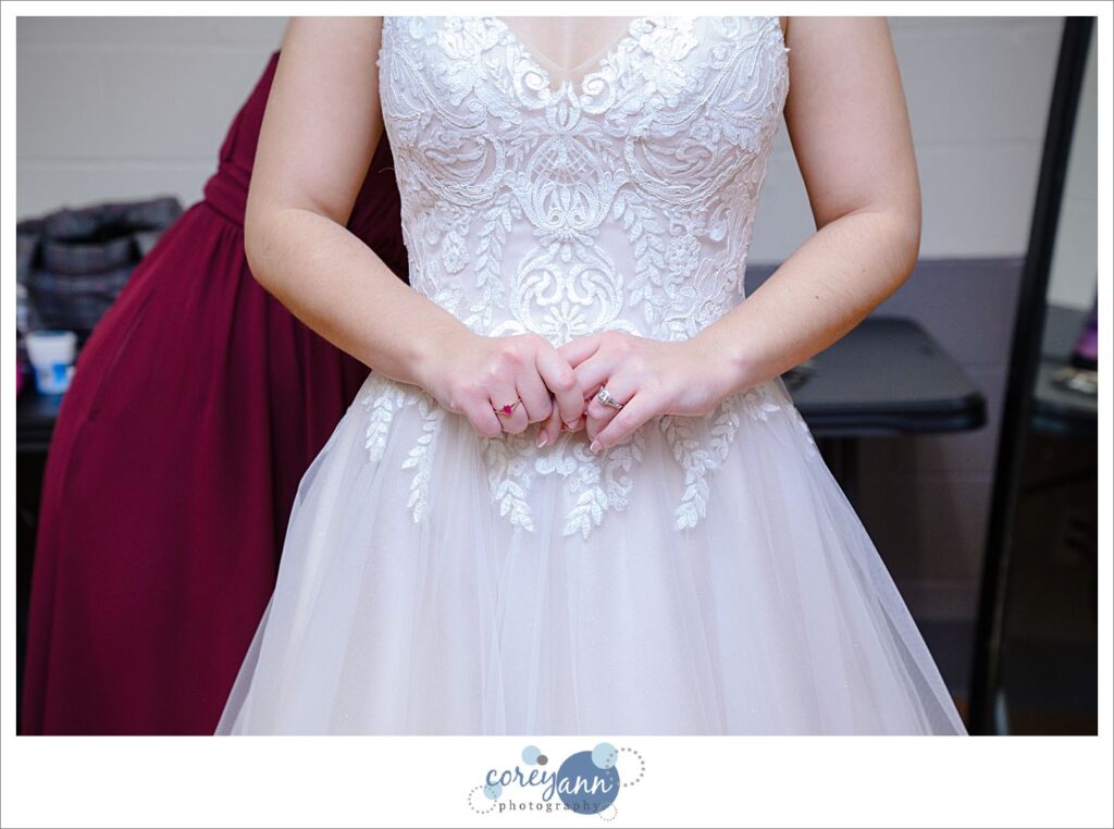 Bride getting ready for wedding ceremony at St. Paul Catholic Church in North Canton