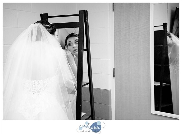 Bride getting ready for wedding ceremony at St. Paul Catholic Church in North Canton