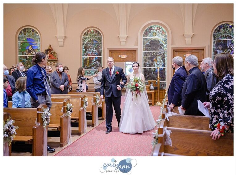 Wedding ceremony at St Paul Catholic Church in North Canton Ohio in December