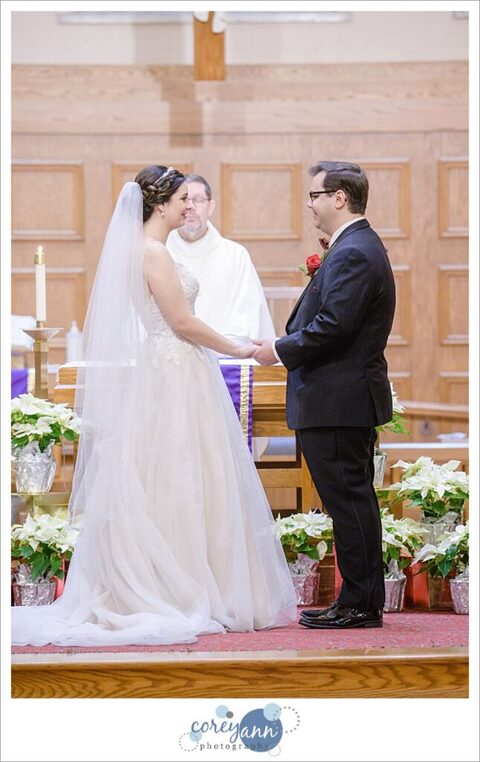 Bride and groom on their wedding day at St. Paul Catholic Church in North Canton