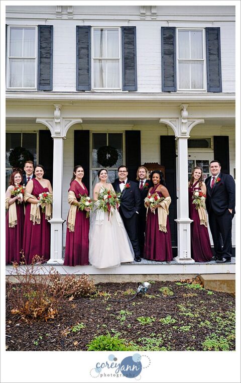 Outdoor portrait in December with bridal party in burgandy