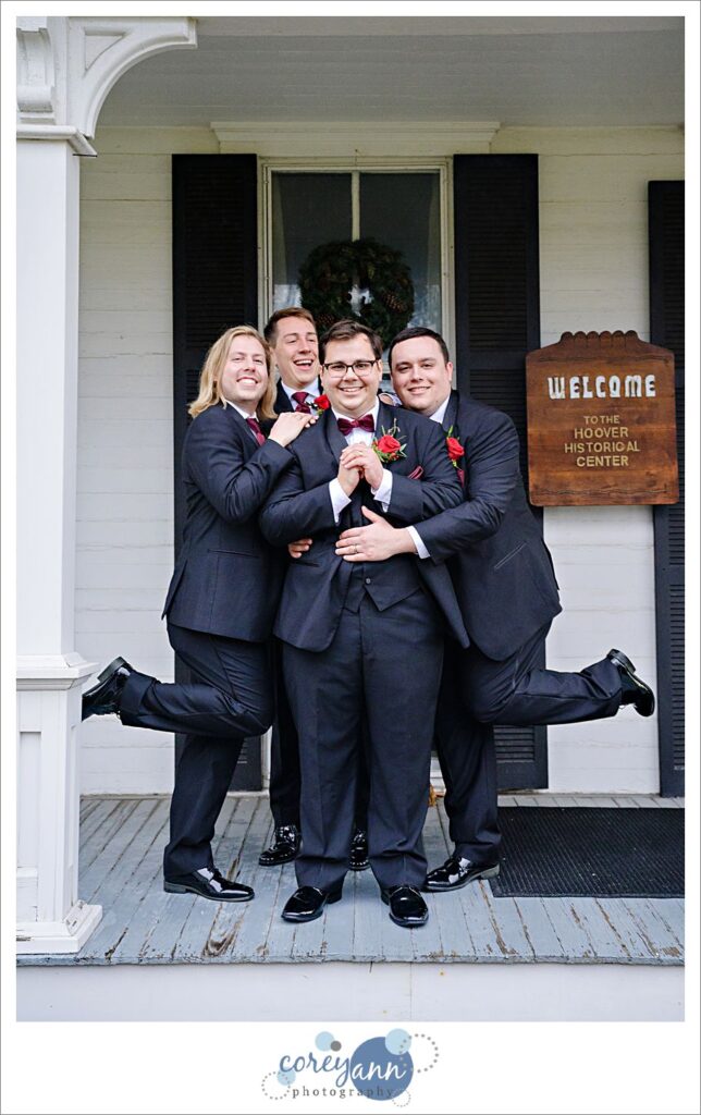 Groom and groomsman having fun on a wedding day in Ohio