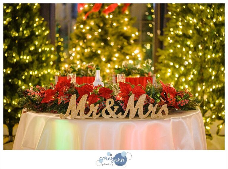 Christmas themed table decor at wedding reception at Pine Ridge Country Club in Wickliffe Ohio