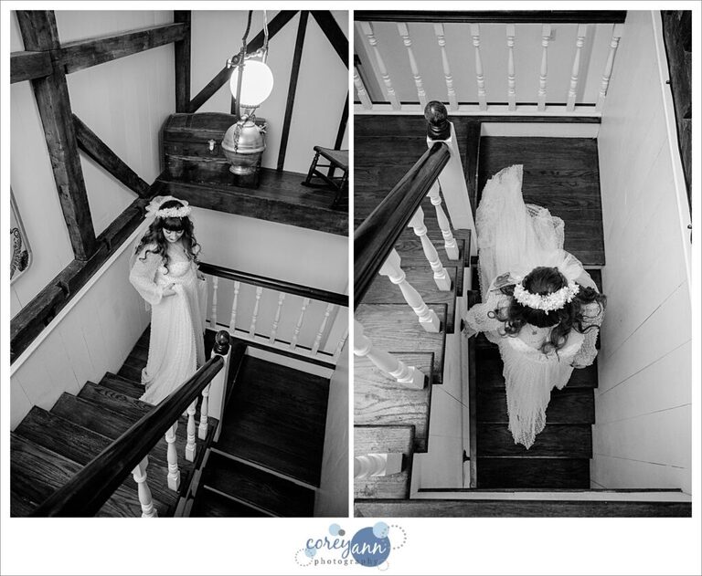 bride walking down stairs from above before wedding ceremony
