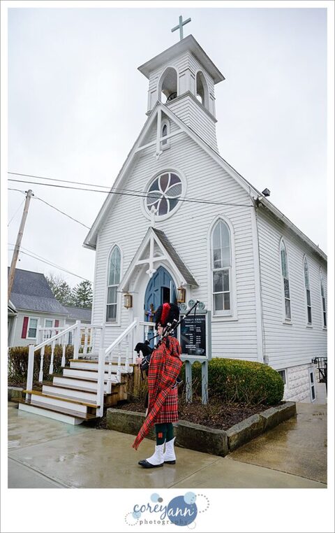 bagpiper outside mother of sorrows in peninsula ohio before wedding