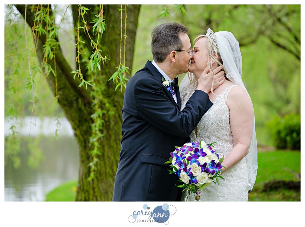 Bride and Groom posing after wedding ceremony at Gervasi Vineyard