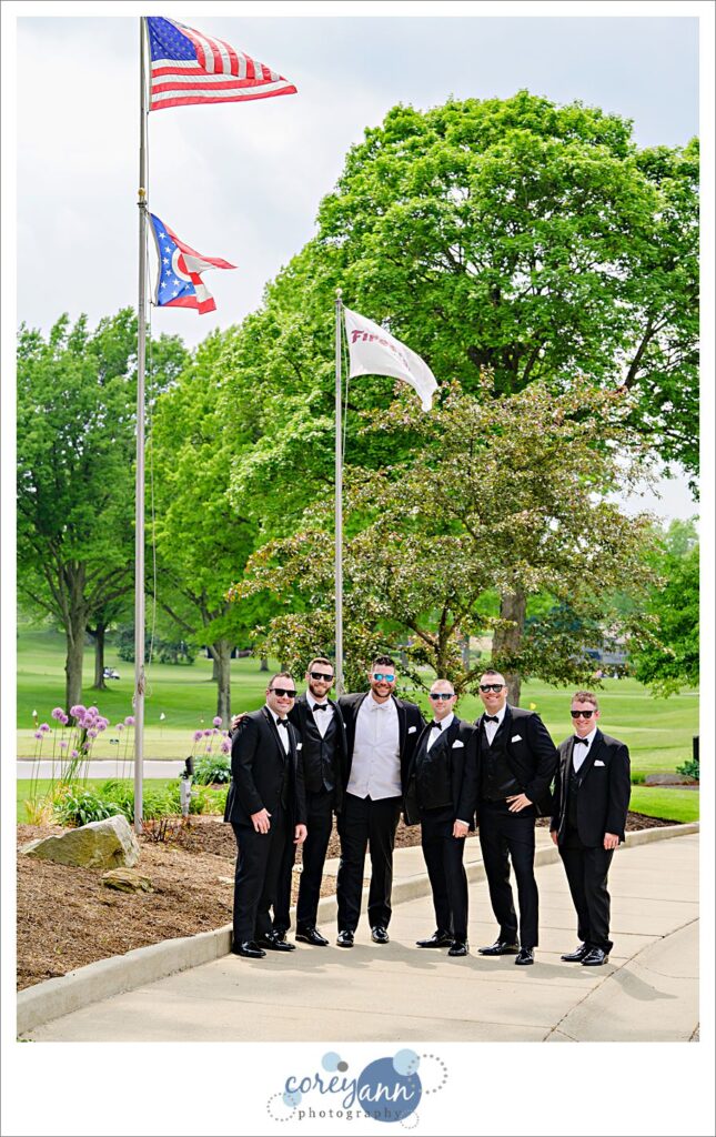 Groom and groomsman in black tuxes at a Firestone Country Club Wedding in Akron Ohio
