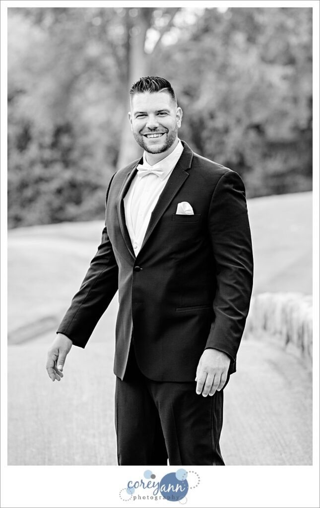 Groom at Firestone Country Club after wedding in Akron Ohio