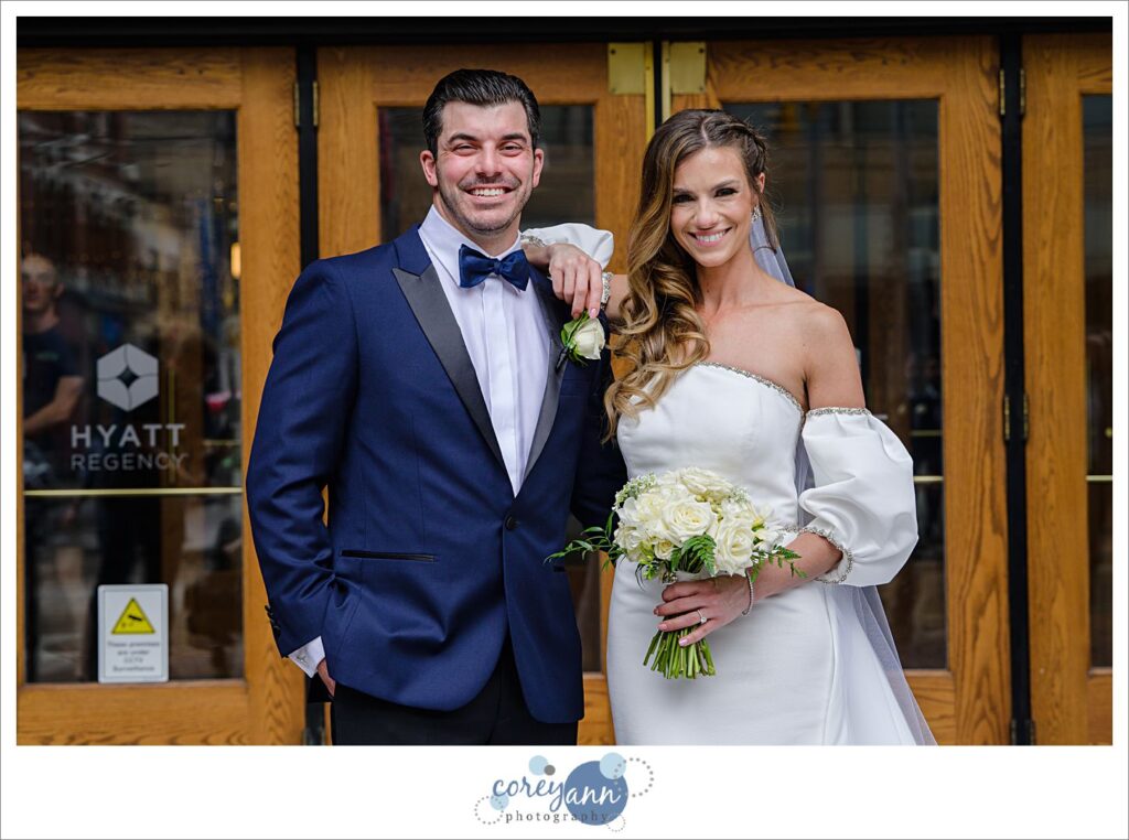 Bride and Groom wedding photos outside the door at The Arcade in Cleveland