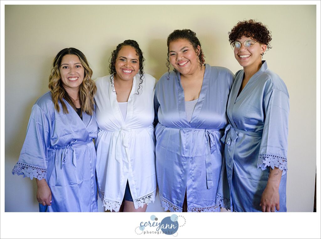 bride and bridesmaids getting ready before wedding in akron ohio