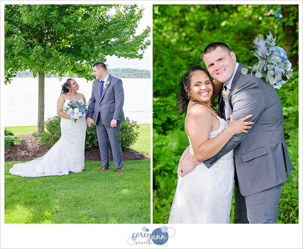 Two photos side by side of a woman and man who are the bride and groom standing in grass near a tree. One photo is taken from further away showing the full length of the white gown and the lake in the background and the second is the man and woman closer up hugging one another