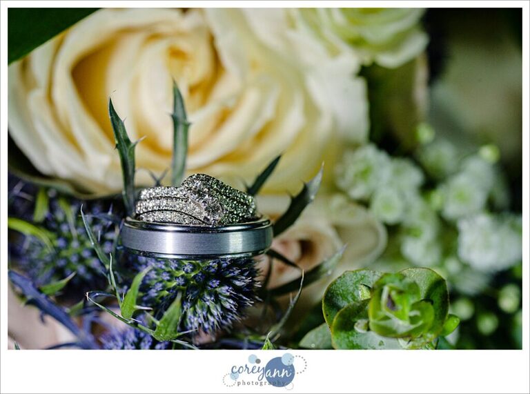 Wedding rings during wedding in June in Ohio