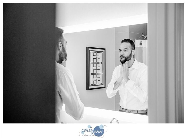 Groom getting ready for wedding in Cleveland at The Arcade