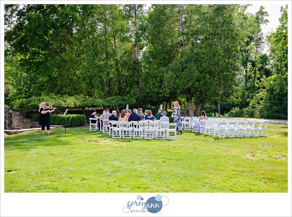 Outdoor wedding ceremony in the garden at Hawken Upper School in Gates Mills, Ohio