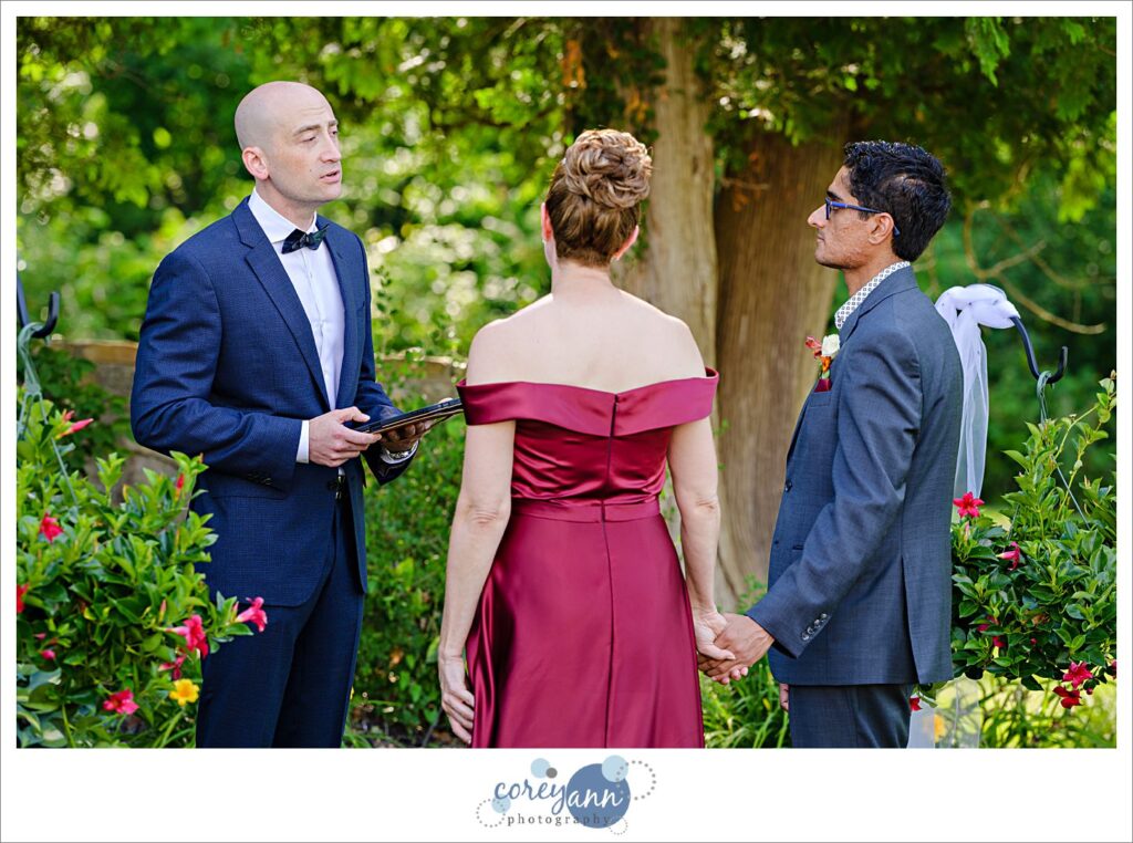 Outdoor wedding ceremony in the garden at Hawken Upper School in Gates Mills, Ohio