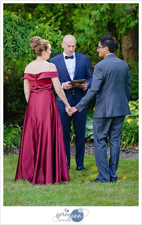 Outdoor wedding ceremony in the garden at Hawken Upper School in Gates Mills, Ohio