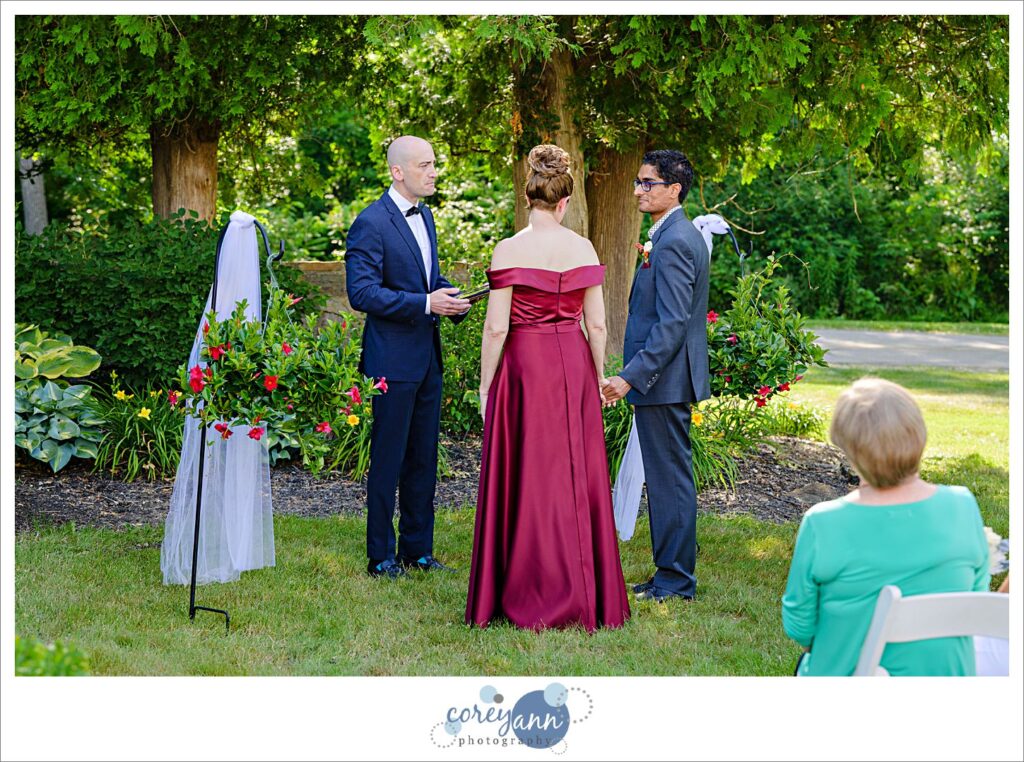 Outdoor wedding ceremony in the garden at Hawken Upper School in Gates Mills, Ohio