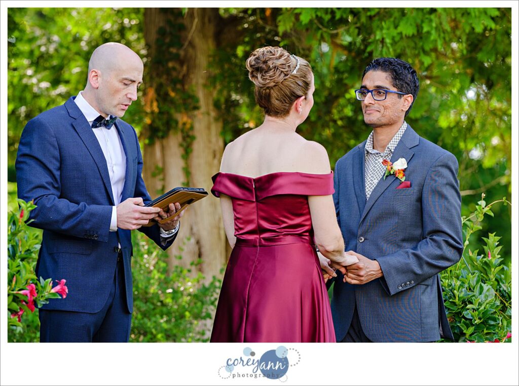 Outdoor wedding ceremony in the garden at Hawken Upper School in Gates Mills, Ohio