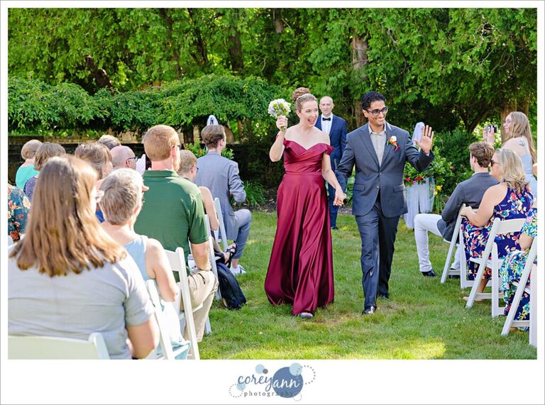 Outdoor wedding ceremony in the garden at Hawken Upper School in Gates Mills, Ohio